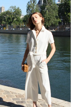 White jumpsuit with short sleeves and gold buttons 2