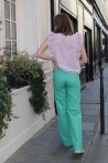green high waisted pants with golden buttons 5