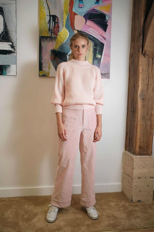large and high waits pants produced in light pink corduroy