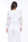 white pants with white buttons on each side 3