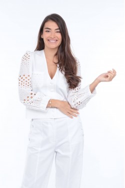 white pants with white buttons on each side